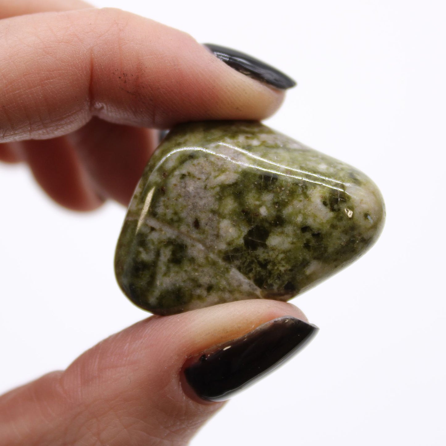 Authentic Bag of 12 Medium African Tumble Stones - Epidote Snowflake perspective detail 4 showcasing clean geometry and natural material finishes