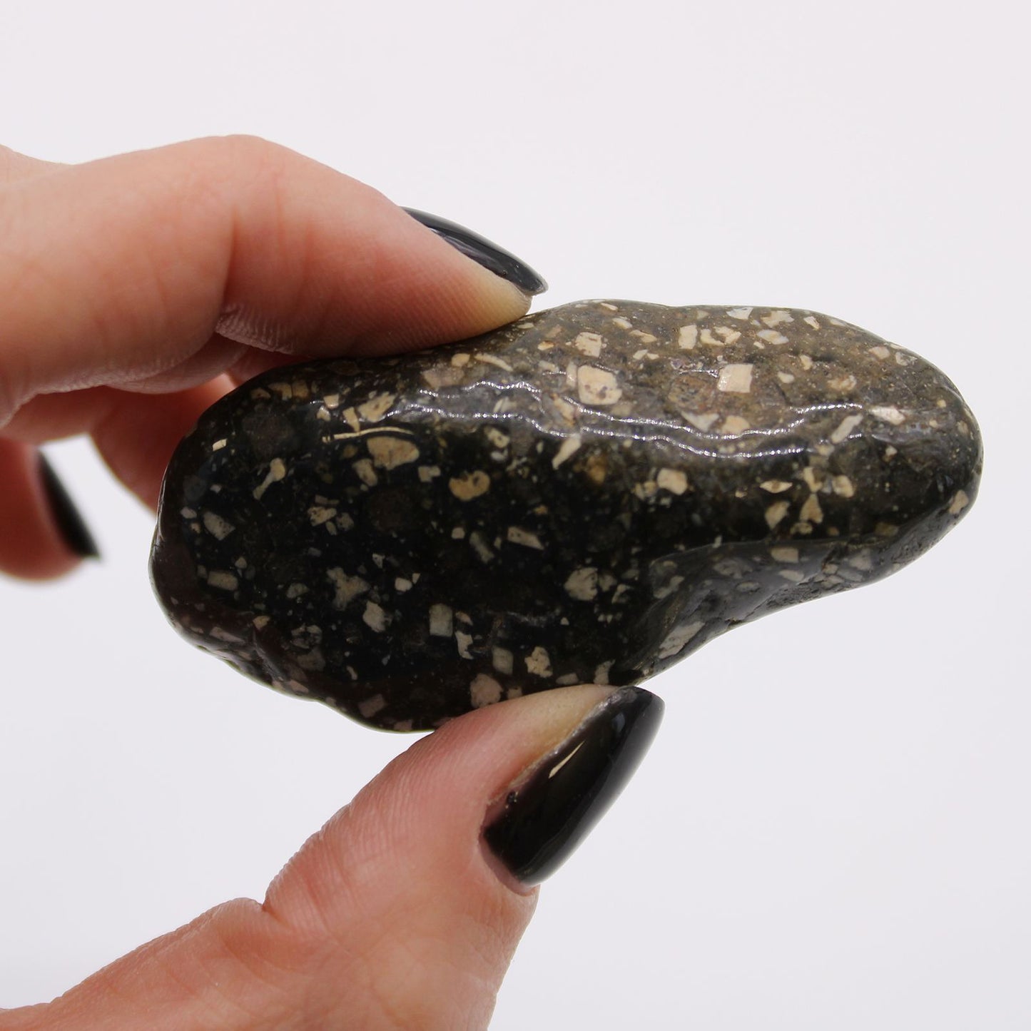 Authentic Bag of 6 Large African Tumble Stones - Guinea Fowl Bag of 6 Large perspective detail 2 showcasing clean geometry and natural material finishes