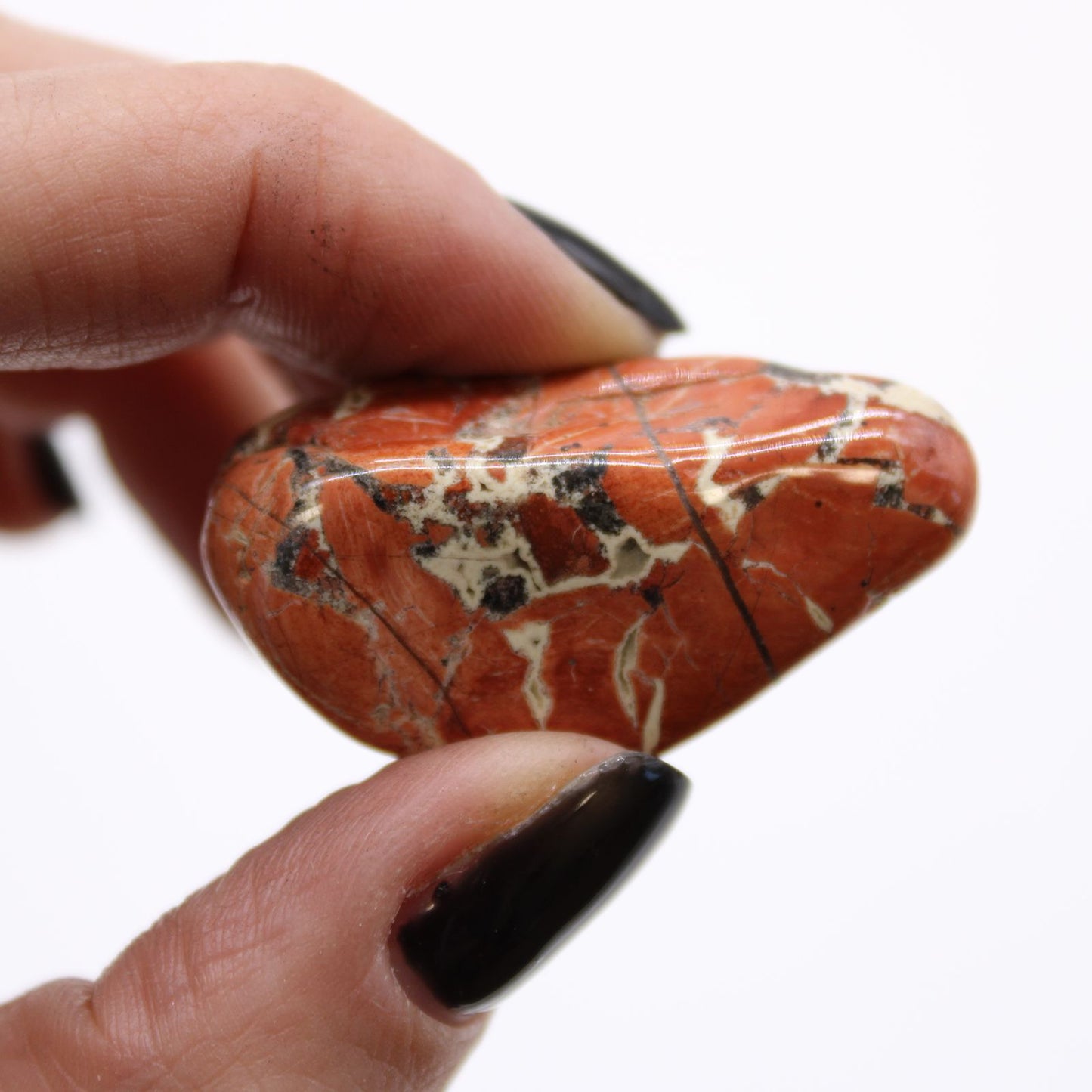 Authentic Bag of 12 Medium African Tumble Stones - Light Jasper - Brecciated perspective detail 3 showcasing clean geometry and natural material finishes