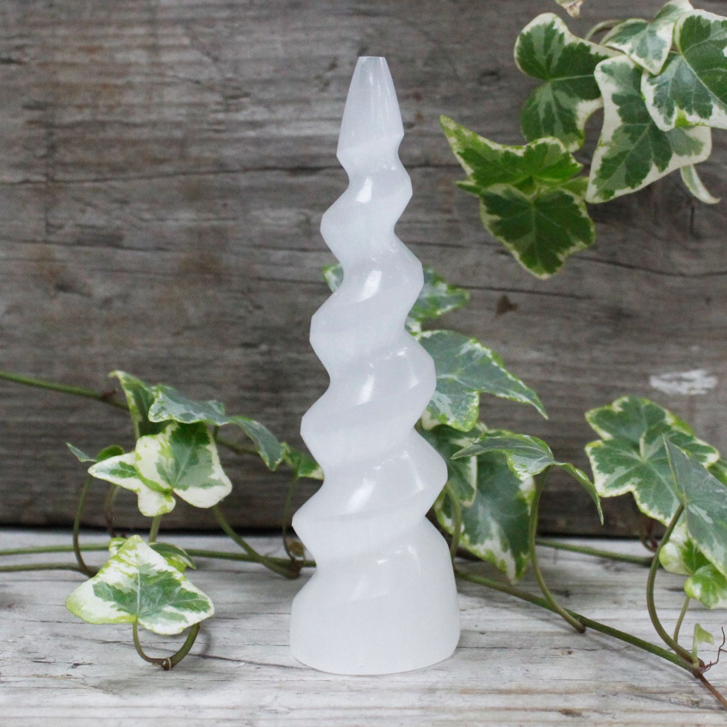 Authentic Selenite Spiral Unicorn Horn Tower - 15 cm perspective detail 5 showcasing clean geometry and natural material finishes