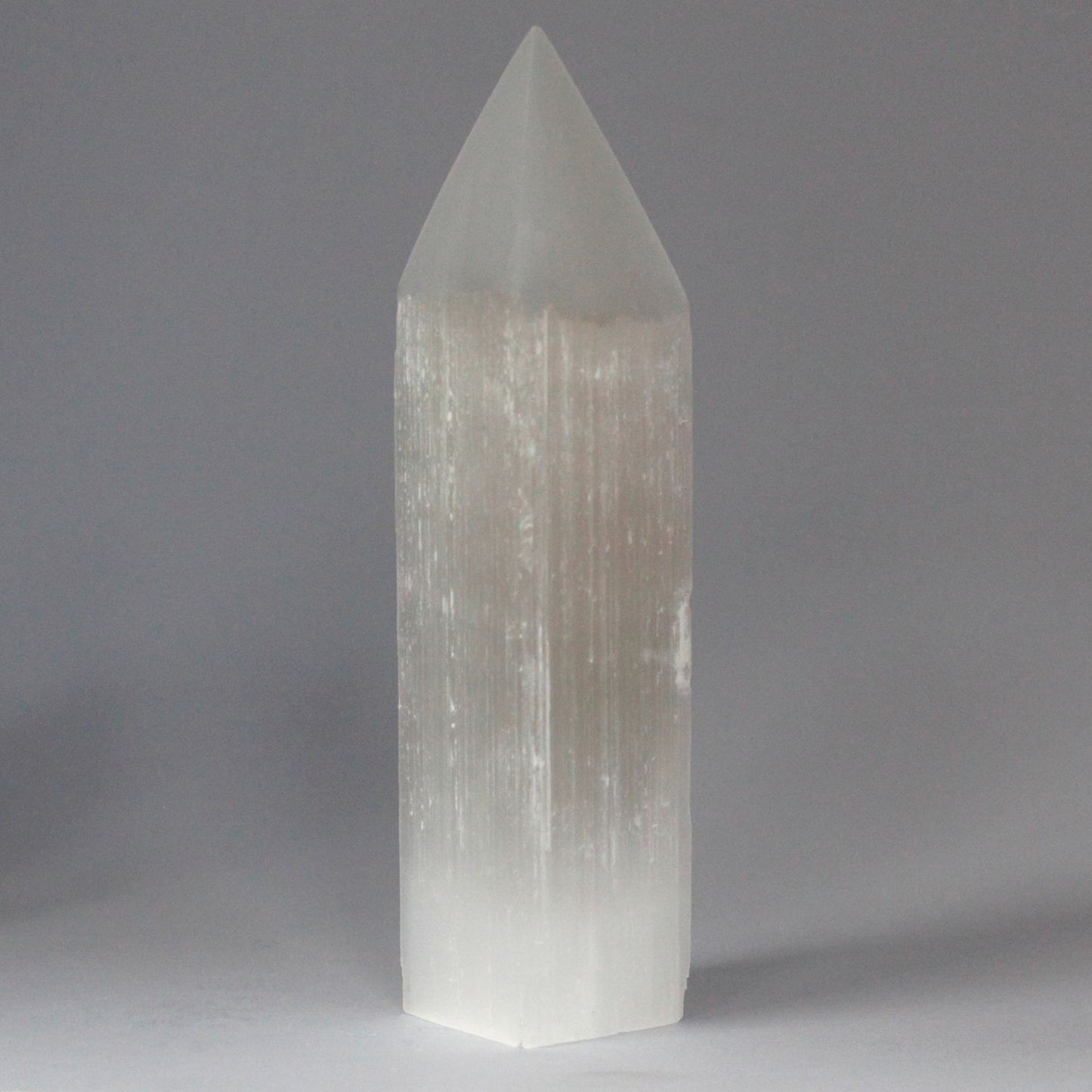 Authentic Selenite Pencil Point Tower - 20 cm perspective detail 3 showcasing clean geometry and natural material finishes