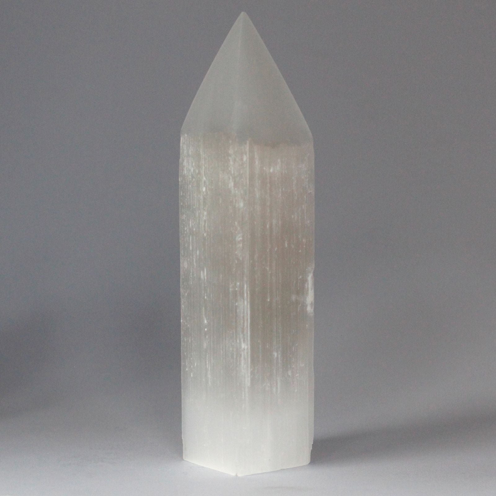 Authentic Selenite Pencil Point Tower - 20 cm perspective detail 3 showcasing clean geometry and natural material finishes