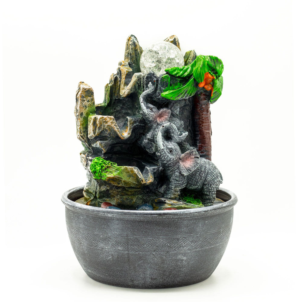 Authentic Tabletop Water Feature – 25cm – Elephants & Palm Tree showcasing clean geometry and natural material finishes