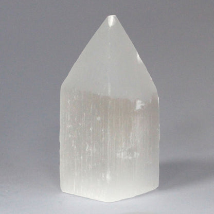 Authentic Selenite Pencil Point Tower - 10 cm showcasing clean geometry and natural material finishes