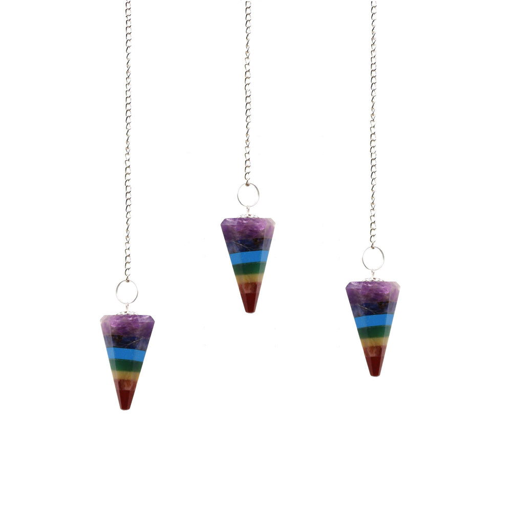 Authentic 7-Slice Chakra Pendulum showcasing clean geometry and natural material finishes