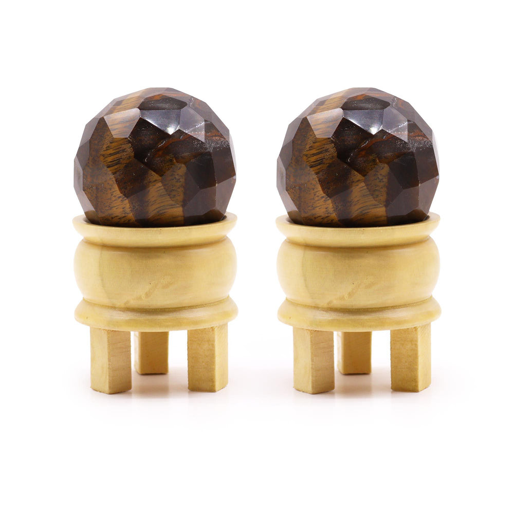 Authentic Gemstone Faceted Healing Ball & Stand - Tigereye showcasing clean geometry and natural material finishes