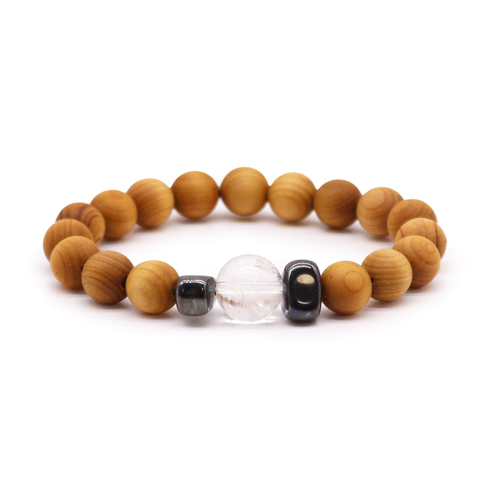 Authentic Cedarwood Crown Chakra Bangle with Clear Quartz showcasing clean geometry and natural material finishes