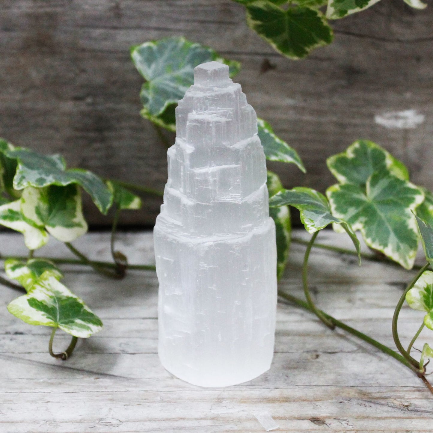 Natural selenite tower 10cm — compact powerfully cleansing crystal for sacred spaces and altars