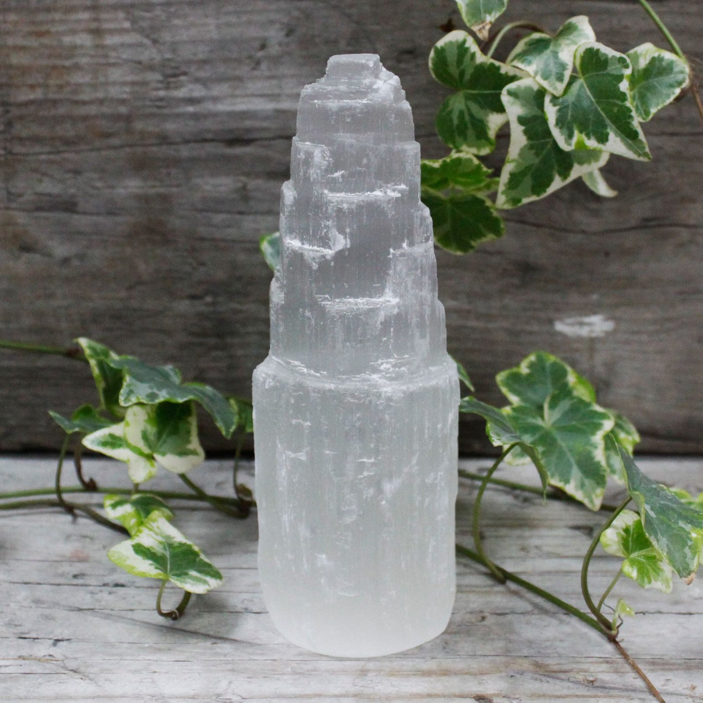 Natural selenite tower 15cm — substantial crystal presence for energy clearing and conscious home decor