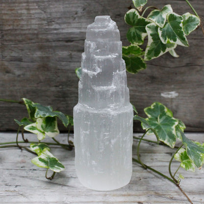 Natural selenite tower 15cm — substantial crystal presence for energy clearing and conscious home decor