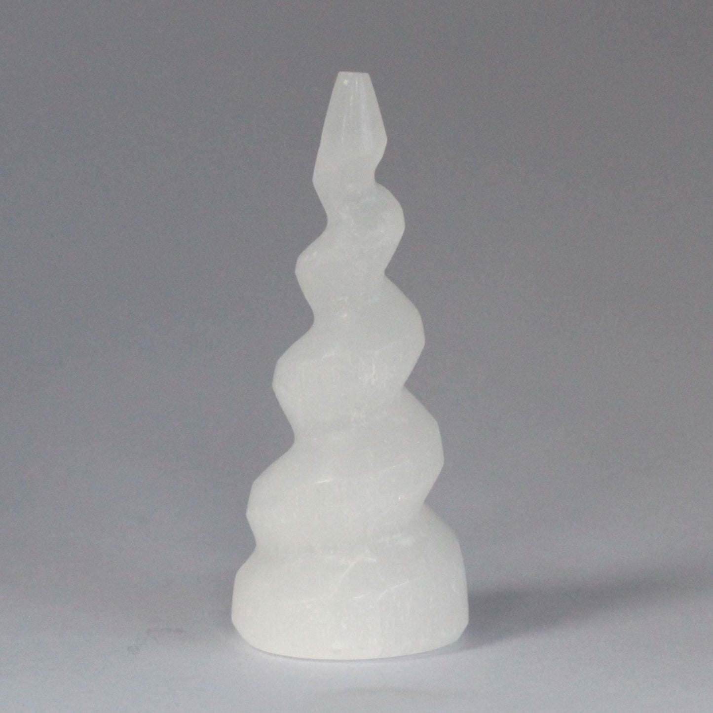 Authentic Selenite Spiral Unicorn Horn Tower - 10 cm perspective detail 2 showcasing clean geometry and natural material finishes