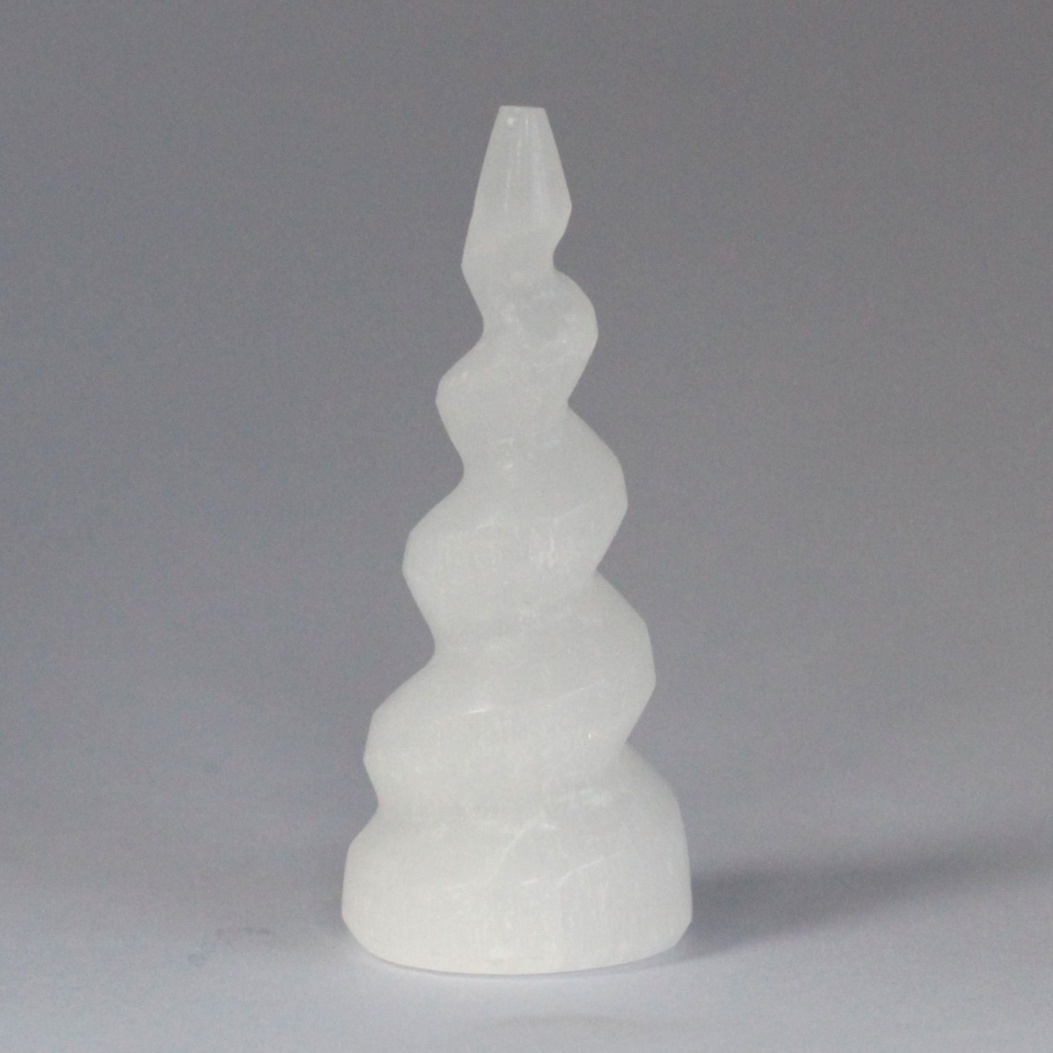 Authentic Selenite Spiral Unicorn Horn Tower - 10 cm perspective detail 2 showcasing clean geometry and natural material finishes